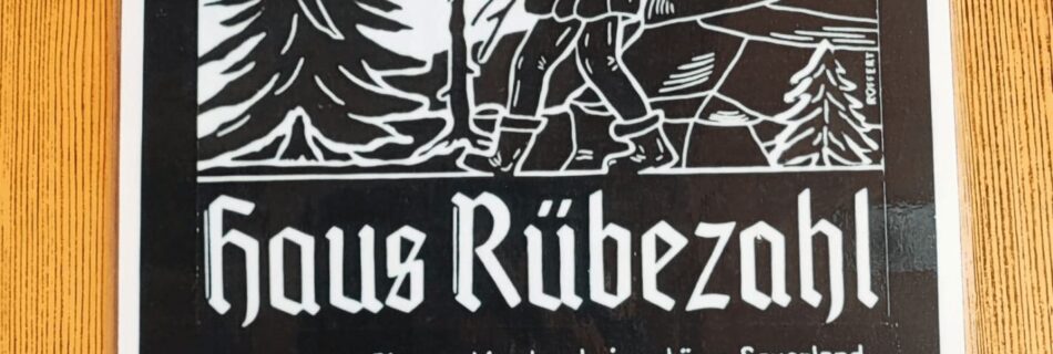 Werbeplakat von Haus Rübezahl in Stübbeken